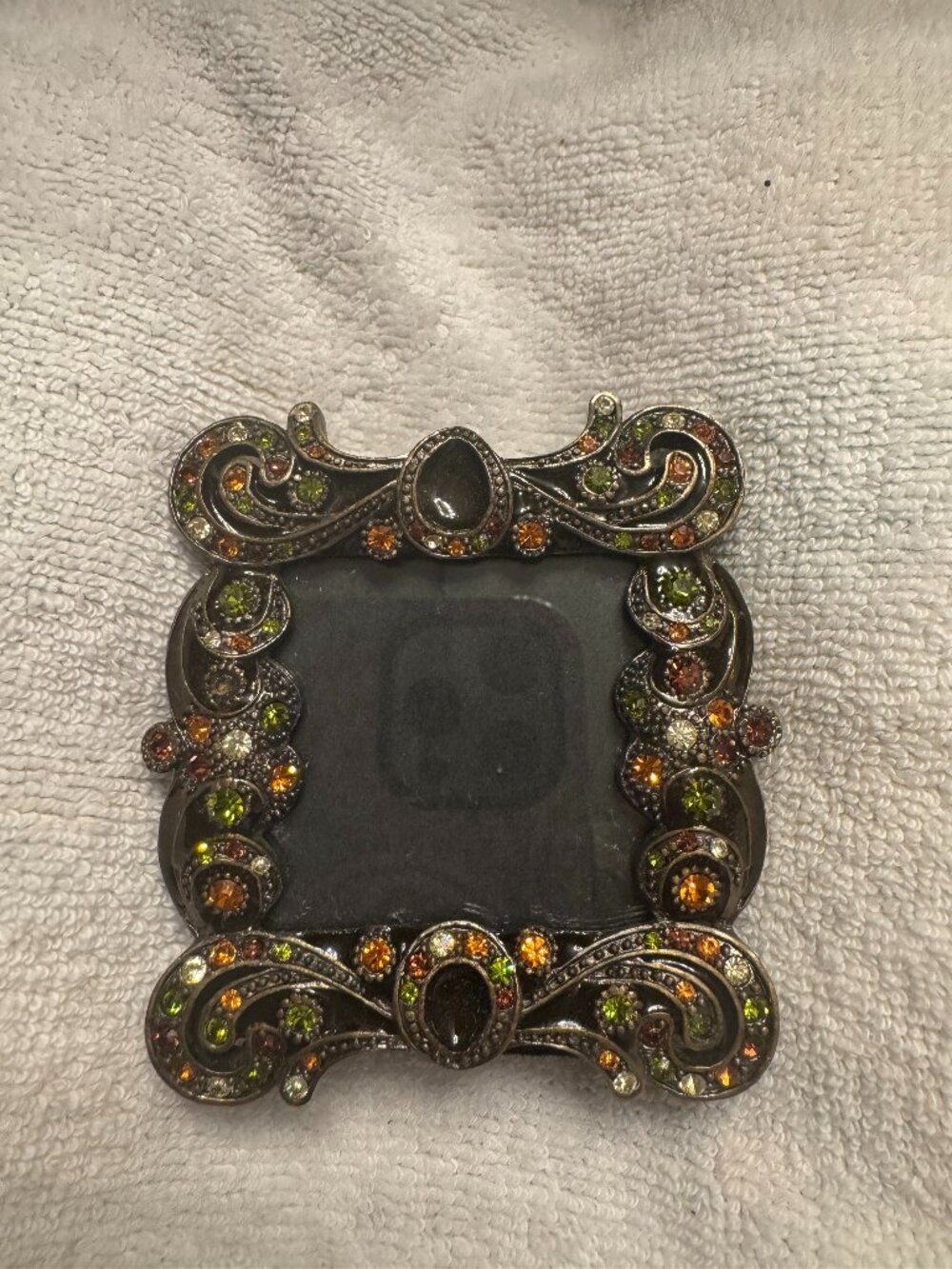 Ornate, bejeweled square frame, 2"x2", bronze-toned with multicolored crystals